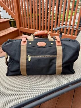 Dakota by Tumi Ballistic Nylon and Leather Duffel Bag, Black, 21”x14”